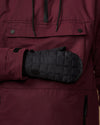 Black quilted mitten with a snap detail and long cuff.