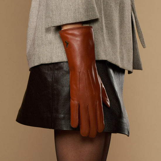 Single extra-long cognac leather glove with rabbit-fur lined cuff