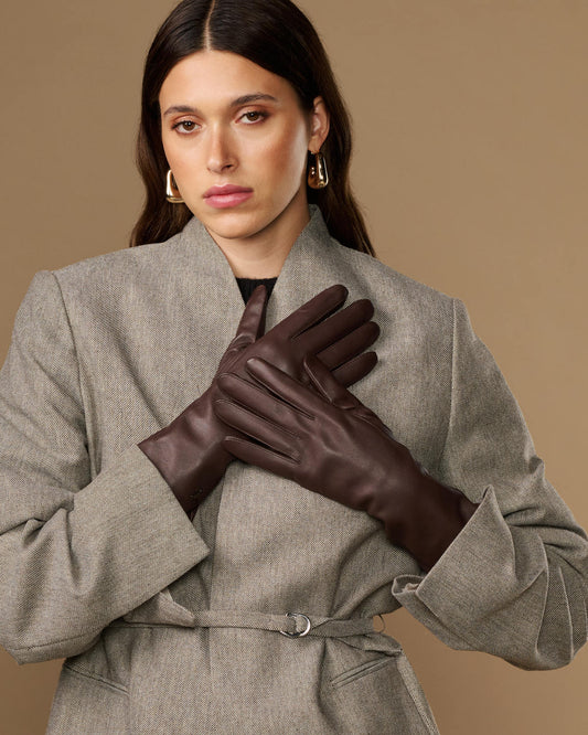 Long dark brown leather gloves with smooth, fitted design