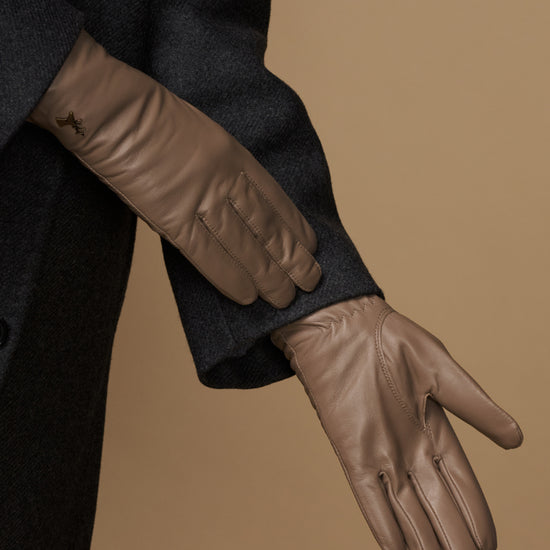 Women’s taupe leather gloves detail, stitched fingers and smooth cuff edge