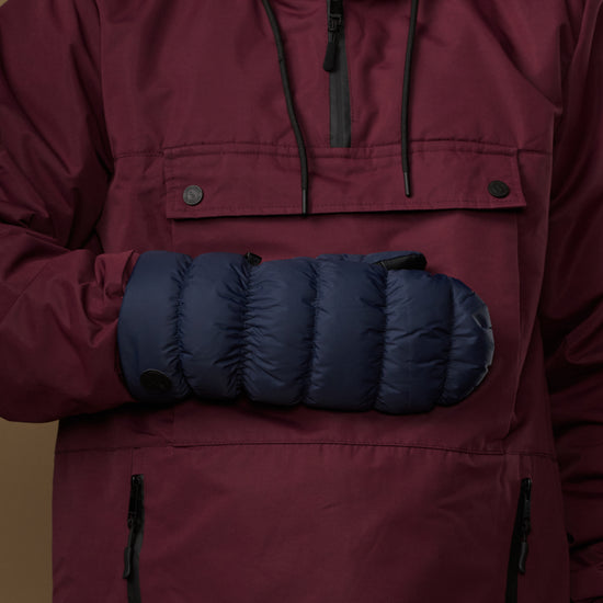 Blue padded mitten with stretchy cuff and snap-button wrist closure