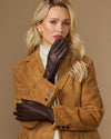 Brown leather gloves with fleece lining, worn and clasped hands front view