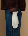White sheepskin leather gloves with fleece lining, hanging straight wrist cuffs