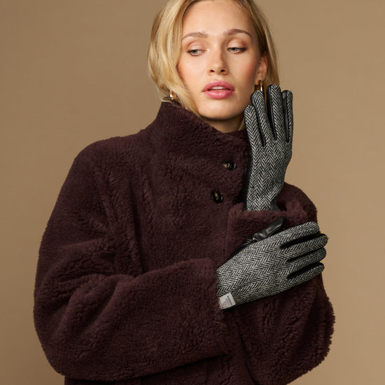 Women's herringbone tweed gloves with black leather palm and stitched cuff
