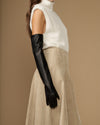 Black long leather glove with visible inner silk cuff lining