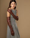 Women's chocolate-brown lambskin leather gloves, side view with long cuff and tight fit