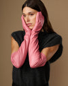 Women's pink leather gloves with long cuffs, draped in front