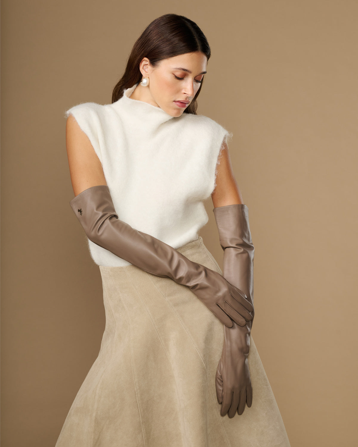 Taupe lambskin leather gloves with long cuffs, hand-to-waist styling