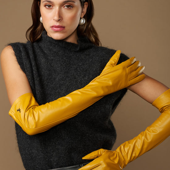 Yellow lambskin leather opera gloves, long fitted sleeves with neat cuffs