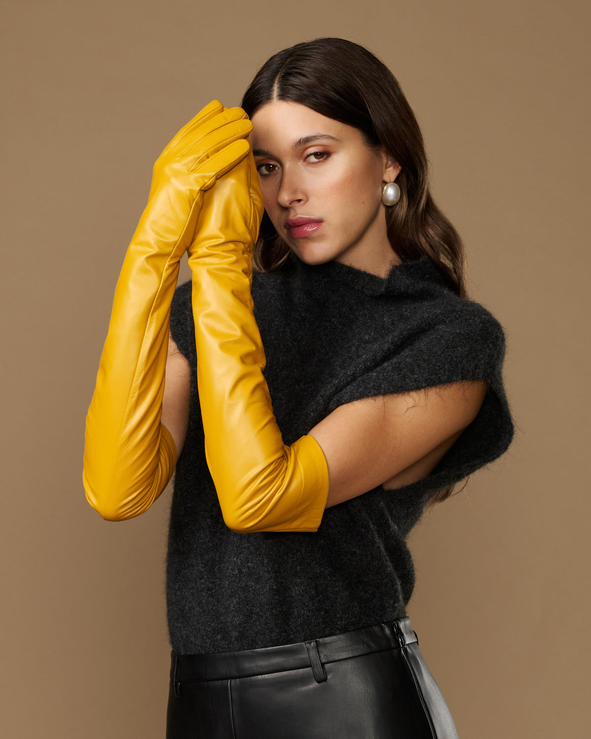 Yellow lambskin leather opera glove, long fitted sleeve with soft sheen