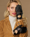 Black leather driving gloves with button details and elastic wrist cuffs, touchscreen-ready.