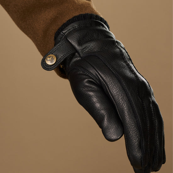 Black goatskin leather glove cuff with press-stud and textured stitching